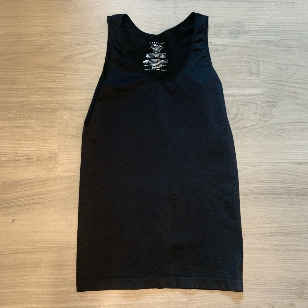 Attention black body tank top. Form fitting, S/M